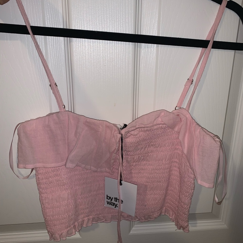 By the way. Light pink crop top